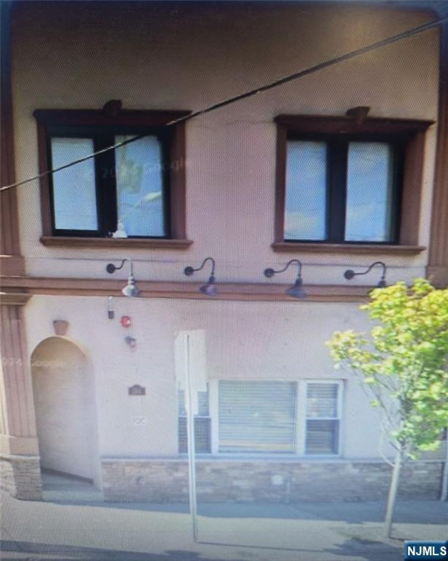 Spacious 2-Bedroom Apartment with one full 1-bathroom. This bright apartment offers a layout with a large living room, and a updated kitchen featuring modern appliances, and laundry in unit. Each 2 bedrooms is a good sized with closet space and plenty of natural light. The unit includes beautiful hardwood floors throughout, high ceilings, and large windows that create an open atmosphere. Steps away from shopping, dining, schools, and public transportation making commuting to NYC. One Parking SPACE for one car," lot number # 4 ".