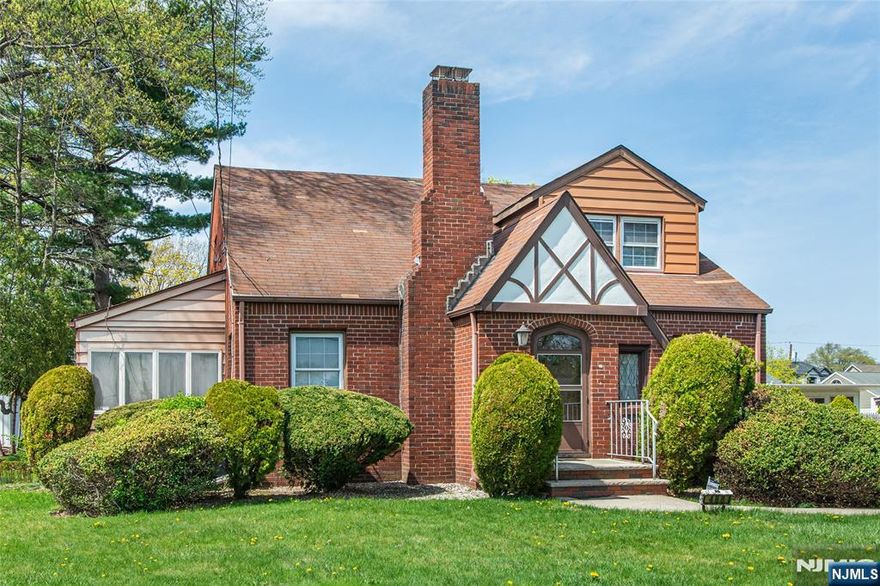 Welcome to this large custom brick home offering spacious rooms and comfortable living throughout. Situated on a sizable lot on a street once known as "Millionaire Way, this home is surrounded by other prestigious properties, adding to its charm and appeal. Inside, you'll find 3 to 4 generously sized bedrooms, including an oversized second-floor bedroom that can easily be divided into two separate rooms. The home features a formal dining room perfect for entertaining and a spacious living room with a cozy fireplace ideal for relaxing evenings. The full eat-in kitchen offers convenient access to the rear of the home, making it easy to bring in groceries from the driveway and two-car garage. The large, freshly painted basement offers endless possibilities finish it for additional living space or use it for abundant storage. Additional highlights include a two-car garage with high ceilings and automatic opener and security system for peace of mind. Located just steps to NYC transportation, major highways, shopping, and all three school levels, this home truly combines comfort, convenience, and potential. A Must See!