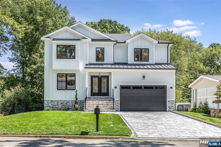 Welcome to your Dream Home! Brand new construction masterpiece on the ULTRA-DESIRABLE area of North Caldwell , featuring approx. 5,000 sqft of finished space. Custom Verticle & Horizontal Hardie Plank Siding w/Azek Trim. Stunning 2 story entry foyer w/herringbone white oak floors, Stunning custom coffered ceiling trim work throughout the 1st level. Butler's pantry leads to dream kitchen w/ CUSTOM Cabinets , matching quartz counter tops & backsplash, walk-in pantry, white oak Custom island , breakfast area & wet bar w/sink. Fireplace w/custom trim work. Powder room Bathroom off the Garage w/ walk in coat closet. 2nd fl features Herringbone white oak floors through out the hallway , 4 Bedrooms, primary suite bedroom w/vaulted high ceilings, his and hers walk in closet, Stunning master bathroom w/spa bath, floor to wall ceiling tile, large walk-in shower, his and her vanity sink. Jr suite w/full bath, walk in in closet , 2 bedrooms connecting w/ jack and jill full bath.