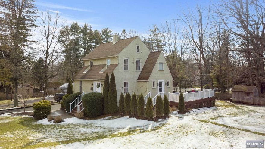 Welcome to this 4 bedroom colonial located in sought after Ramsey NJ! Inviting first floor features large formal living room, formal dining room, updated kitchen with center island, family room , half bathroom , and laundry area. The second floor offers 4 bedrooms and 1 full bathroom including a 19x12 primary suite. Hardwood floors throughout, nice curb appeal, room to grow, and a huge deck overlooking park-like fenced property that is perfect for athletics and gatherings. Conveniently located minutes away from the center of the town and NYC transportation (NJ Transit Train), this central location is ideal for dining, shopping highly-ranked Ramsey High School and transportation.