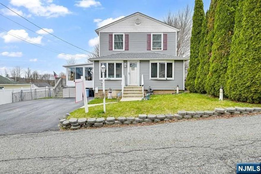 This Charming Colonial Home In The Upper Greenwood Lake Area Has 3 Bedrooms, 2 Bathrooms, And A 3 Season Sunroom Room Heated! Highlights Include A Pellet Stove, Newer Furnace, New Sunroom Windows, A Generac Generator, New Roof, Remodeled Kitchen, And A Beautiful Cambridge Stone Paver Patio! Updates Have Been Made Over The Years To Enhance The Property! The Property Also Features Central Air, Spacious Rooms, Ample Closet Space, And A Fenced-In Yard! Upper Greenwood Lake Offers A Variety Of Activities Such As Motor Boating, Kayaking, Swimming, Fishing, And Jet Skiing! Additionally, Residents Can Enjoy Year-Round Activities Including Shopping, Dining, Golf Courses, Ski Resorts, Wineries, Apple Orchards, Drive-In Theaters, And More!