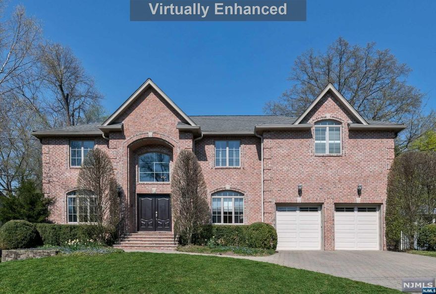 Beautiful Brick Center Hall Colonial on Closter's East Hill. This custom built home is an entertainer's dream & practical for everyday living. Bright 2 story entry foyer is open to a spacious dining rm and living rm w/ custom built mahogany wood bar. Gourmet eat-in kitchen w/island & breakfast area has sliding doors to paver patio and is open to the spacious family rm w/ gas fireplace. The office, powder rm, laundry rm and 2 car garage complete the 1st floor. Striking staircase lead to an enormous primary suite on 2nd floor, with en suite spa-like bathroom and two walk-in closets, along with three additional bedrooms all with en suite bathrooms. Lower level is fully finished w/amazing rec space, den/2nd office, full bathrm, closets galore & storage room. Meticulously designed landscaping and flat fenced private backyard. Hardwood flooring & tons of light. Award winning school system, nature trails, vibrant downtown area, transportation & just minutes to NYC! Floor plans available