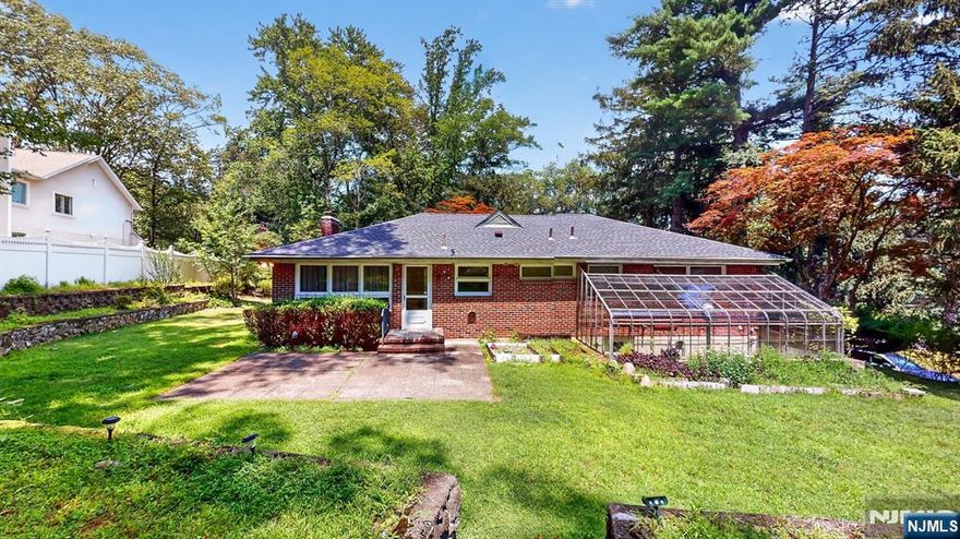 New Listing in Highly Sought-After Woodcliff Lake, NJ! Looking for one-floor living with all the modern comforts? This beautifully renovated 3-bed, 3-bath home boasts an open-concept living, dining, and kitchen perfect for entertaining. The finished ground level is a game-changer with a dedicated gym, spacious family room, an additional full bath, and a flexible guest bedroom or study â€“ perfect for kids and adults alike! Features include a 1-car garage, EV charger, newer utilities, and a charming wood fireplace. Situated on a generous 0.53-acre lot, you'll have an oversized backyard complete with a greenhouse for endless gardening possibilities! Located in an area with the best school system, an easy train commute, and affordable taxes. Your family's future starts here!