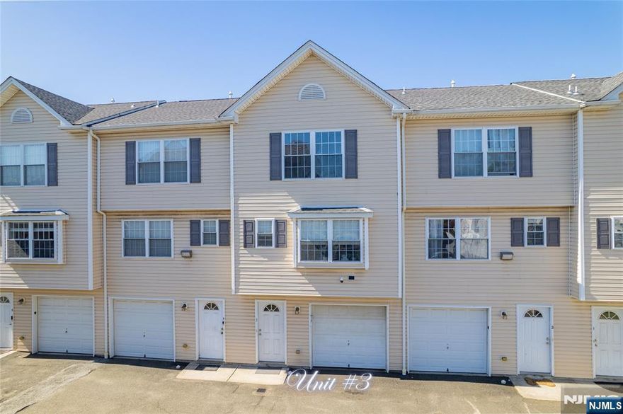 Bright, Spacious, and Perfectly located Townhouse built in 2006. This home offers the ideal blend of comfort and convenience, 25 minutes to NYC, transportation is near. Featuring 2 Bedrooms, 1.5 Baths, this home boasts a generous Living room w/gas Fp, Formal Dining room, Kitchen that is sun-filled with natural light, 2nd Level: 2 Bedrooms, Full Bath, 3rd Level: Attic great for storage, Ground Level: Family room/ 3rd Bedroom/or Office, w/sgd to Patio Laundry room, entrance to Garage, 2 Zone Forced Hot Air, Central Air, Do not miss this beautiful home. 2 Parking spaces and allowed to park in front of garage, Common area on the side , fenced in common area great for have parties or get together
