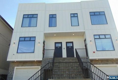 Photo of 108110 Mill St #301, Paterson, NJ 07501 (MLS # 26001483)