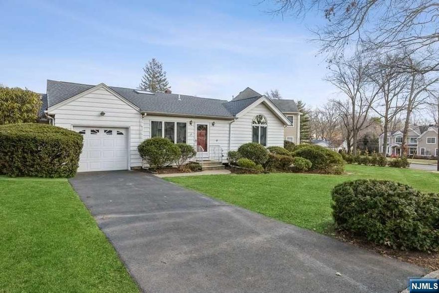 Great Location and one-floor living! This spacious and sun-filled 3 BR, 2-1/2 expanded Ranch is located on a quiet sought-after street in a neighborhood of comparable and higher priced homes. Offering an open floor plan design this home features a large living room with skylight; dining room; eat-in-kitchen with access to 1 car garage; office; 2 Bedrooms; Full Bath; Primary BR with walk-in closet, sliding glass door to new deck and full bath. new roof and deck, central air, newer windows, wood floors, inground sprinklers and more. Close to NYC bus and train; short walk to Glen Rock's top rated schools; 4 miles to world class shopping; 12 miles to George Washington Bridge. Come Visit!