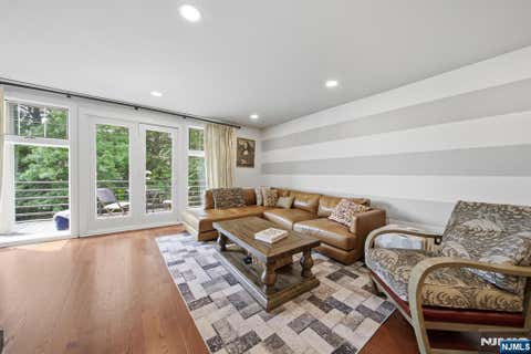 Photo of 31 Grand Cove Way #E31, Edgewater, NJ 07020 (MLS # 26031401)