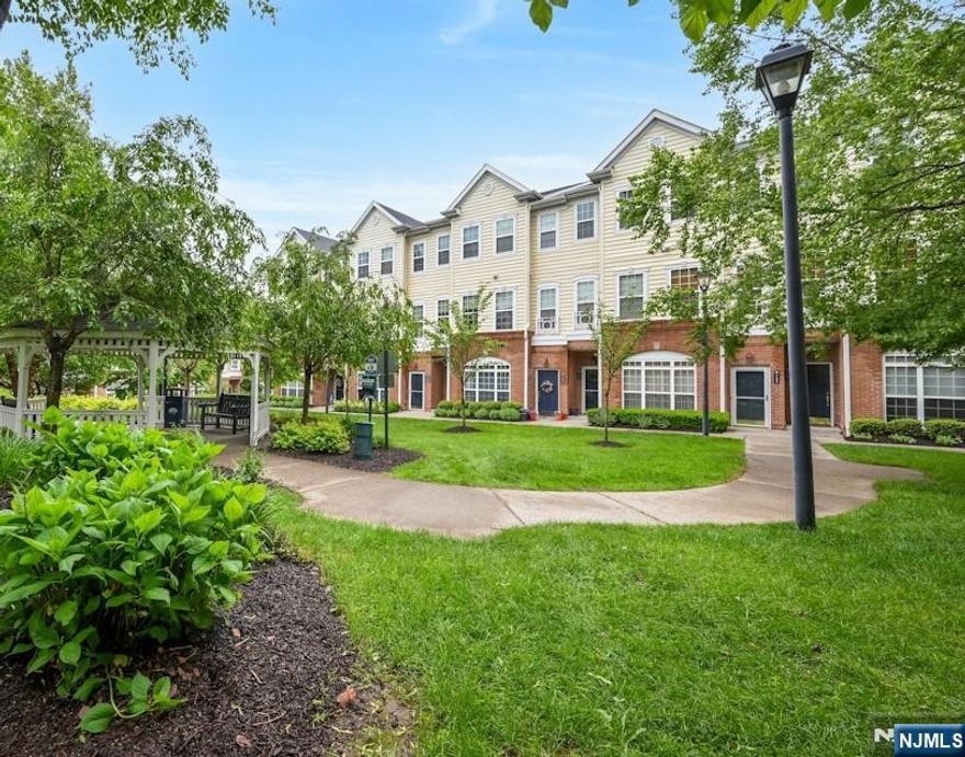 Welcome to Essex Park, a stunning townhouse designed for modern living in a gated, pet friendly community. You will adore this elegant, bright 2 Bedroom, 2.5 bath plus office/gym/guest alcove. The main level features an open floor plan; sunlit living room, dining area, balcony and beautifully updated kitchen featuring stainless steel appliances. Upstairs, the expansive primary suite complete with a walk-in closet, soaking tub and separate shower. A second bedroom also offers a generous walk-in closet, while the large bonus room provides the perfect space for a home office, gym, or guest area. A washer & dryer on the same level as the bedrooms ensures everyday ease. Additional highlights include a one-car garage with mudroom, large double closet for coats & shoes. Access to fabulous community amenities including a versatile clubhouse, two gazebos, large courtyard, and a heated saltwater pool. Plus located across the street Hendricks Field Golf Course. A commuterâ€™s dream! Located just minutes from major highways, public transportation, shopping, dining, and entertainment. With nothing to do but unpack, this town home is ready to welcome you home!