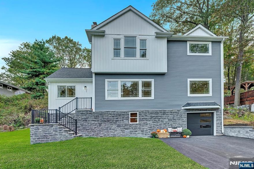 Welcome to your dream home in the highly sought-after High Crest Lake community of West Milford! This beautifully renovated 3-bedroom, 4-bathroom home offers modern style and comfort throughout. The main level boasts an open floor plan with gleaming hardwood floors, a cozy fireplace, and plenty of natural light perfect for both entertaining and everyday living. The chef's kitchen seamlessly flows into the dining and living areas, creating an inviting space for gatherings. The spacious primary bedroom features an en-suite bath for ultimate privacy, while two additional bedrooms and bathrooms provide plenty of room for guests. The fully finished walk-out basement includes a 4th bathroom and offers endless possibilities home office, media room, or guest suite! Enjoy peace of mind with a brand-new septic system, plus a double-wide driveway and 1-car garage for convenient parking. High Crest Lake offers an unbeatable lifestyle with its Sailing Club (complete with summer sailboat races every Sunday), private beach, fishing, playground, picnic area with BBQ pits, and a clubhouse/lodge for private parties, holiday events, and Monday Night Football gatherings. This is more than a home, it's a year-round retreat!