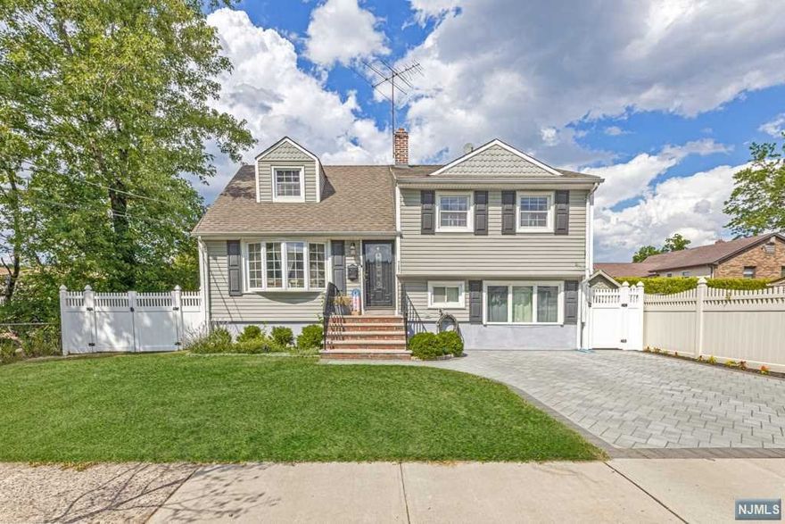 Conveniently located in the desirable Bergen County neighborhood of Ridgefield. Get the best of both worlds with suburban living yet only ten minutes away from NYC. Easy access to highways and public transportation within walking distance to the top rated school district. This well built home features a nice flow-through living/dining and kitchen area with access to the oversized deck surrounding the above ground pool. The property has a large backyard with a lot of potential including a storage shed and green house. Second floor features 3 nice size bedrooms with large storage walk up attic. Beautiful curb appeal with a large 2 car paved driveway This is a rare opportunity. only 4 houses on the cul de sac. Come make this house your home.