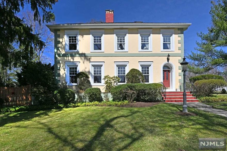 Charm & character abound in this lovingly cared for, Circa 1906 Italianate Colonial. Some of its amazing details are: Herring Bone Wood Floors, 9.5 Ft Ceilings, Stained Glass Windows, Pocket Doors, Rounded Archways, 2 Distinct Fireplaces, Window Seats, French Doors, Brick Floors & Antique Moldings Medallions & Hardware. A Grande Home with over 3200 Sq Ft of living space boasts a Living Rm & Dining Rm w/ 2 Fireplaces & a Chefs delight Kitchen with an Island, abundant Storage & Counters plus a Breakfast area with a sunny Window Seat. A Mud Rm, Laundry, Full Bath, Den w/Tin Ceiling + a Family Rm w/ Skylights overlooks the Deck/Patio and secluded Yard. Easy direct access from an oversized 2 car Garage. Upstairs to a generous Primary Bedroom w/ ample closets & a walk up attic w/ huge storage-closet area (room to expand?). A wide hallway leads to 3 additional Bedrooms plus an Updated Bath w/ Soaking Tub, Double Sinks & Shower completes this level. Newer Heat too. You will fall in Love!