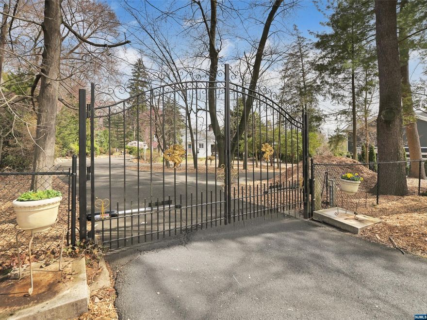 This property is truly one of a kind, with 3 bdrs, 3.5 baths and 2500 SF. of ranch style living. The just under one acre property offers a pool, complete with pool house and cabana, is beautifully landscaped and fully fenced in. The EIK with Viking appliances is perfect for casual dining and with a FDR for entertaining. The pine paneled FR w/woodburning FPL opens to a large patio overlooking koi pond and private rear yard. The large LR with Gas FPL opens to a three season screened in porch that offers outdoor living without the bugs. Primary bdr has WIC and a Full bath. Also on the main floor are two add. BDRS, Full bath, PR and an office space. The lower level offers a "theatre room" with surround sound, "bar" room, home gym, lots of storage, laundry and full bath with S/S. The home is close to shopping, schools and transportation. If you are want a home offering space and privacy yet close to town, this is the home you are looking for.