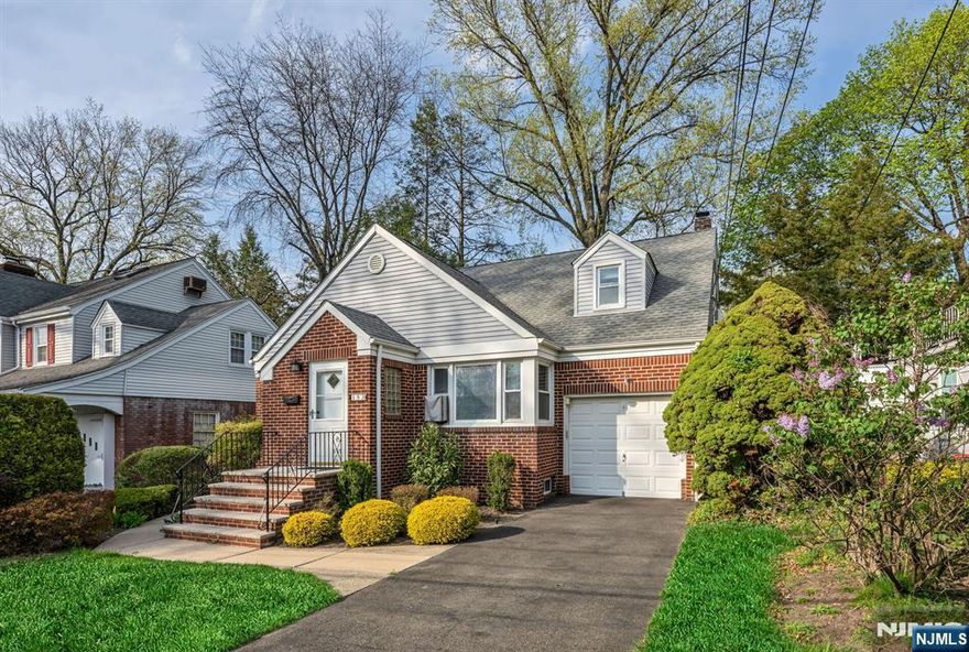 Multiple Offers, Best & Final Scheduled For Tuesday, 4/21/26 at 3PM. Please email offers to Scott@SelleckSellsNJ.com. What homes are for sale in Leonia, NJ, under $680,000?. This one. Three-bedroom, one-bathroom brick single-family home.Interior features: hardwood floors throughout, custom-painted interiors, upgraded kitchen with granite countertops, stainless steel appliances, gas range, double-door fridge with ice maker,microwave above range oven. Renovated full bathroom, separate formal dining room, attached one-car garage, and a professionally installed French drain system. Does this home have expansion potential? Yes -- a high-ceiling full basement and full-height attic both offer immediate buildout opportunity for a fourth bedroom, second bathroom, family room, or recreation room without structural additions. Location: directly across from Leonia Tennis Club, steps from Leonia Swimming Club, and Sylvan Park. NJ Transit Bus Route 166 to the Port Authority Bus Terminal provides direct access to Midtown Manhattan for commuters. Quick access to the George Washington Bridge and Route 4. Leonia Public Schools, Bergen County, are recognized for consistent Board of Education academic achievement and strong district performance.