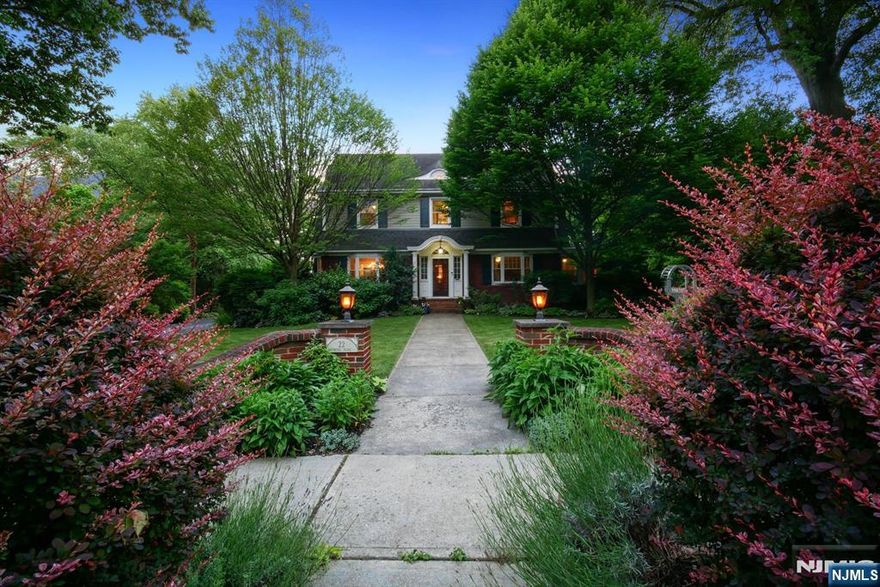 Timeless Elegance Meets Garden Serenity: Nestled in Montclair's prestigious Estate Section across from Porter Park, this Montclair Garden Tour destination blends charm, sophistication, and natural beauty. Surrounded by curated perennial gardens, this six-bedroom, three-and-a-half-bath home offers urban convenience and a tranquil retreat. The newer eat-in kitchen with granite counters and stainless steel appliances flow onto a deck with a sunken hot tub, bluestone patio, firepit, and fountain. The private yard is perfect for kicking a ball, relaxating or gardening. Steps from Downtown Montclairâ€™s top restaurants, bars, and festivals, NYC train access is less than a mile away. Enjoy luxury living and natural beauty in the heart of Montclair.