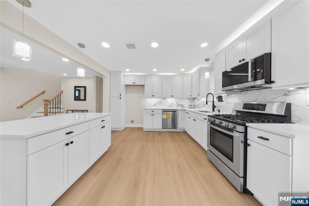 Photo of 4 Melody Lane, West Milford, NJ 07480 (MLS # 26012287)