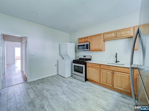 Photo of 193 Clerk St, Jersey City, NJ 07305 (MLS # 26033896)