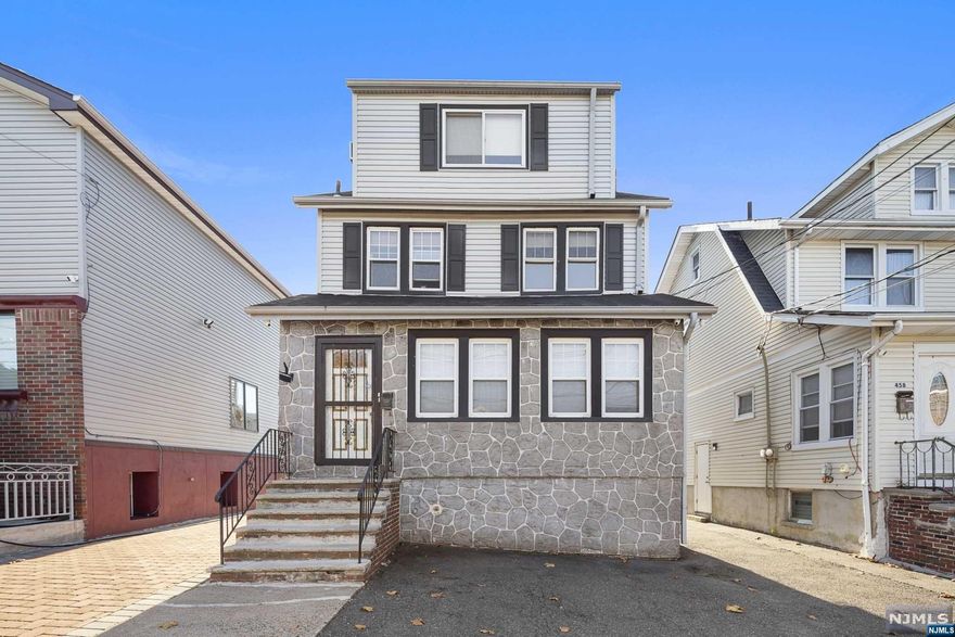 2 Family near Cliffside Park Border - Bring your bright ideas and renovate to your taste! Well maintained home. Unit 1 features a 1 bedroom apartment with a wood burning stove. Oversized washer and dryer. Unit 2 is a duplex apartment spanning 2 levels with a nice kitchen with ceramic tile and dishwasher, cozy Living Room wood burning stove, 2 oversized bedrooms on the top floor. Unfinished Basement.Nice private back yard. 2 Parking Spaces in front. 3 zone heat. Makes a great investment property or a nice place to call home. Come take a look!