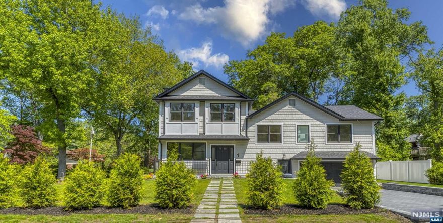 Welcome to this stunning new construction on existing foundation on a desirable street in Norwood. This exceptional residence offers the perfect combination of modern elegance and an open space layout with 5 bedrooms & 5.5 baths. The open concept design seamlessly connects the living, dining, and kitchen areas, filled with an abundance of natural light that flows creating a warm and inviting atmosphere. Second floor features 3 bedrooms and 2 full baths. Third floor features a large master bedroom with 2 closets, another suite and laundry room. The lower level offers additional living space that can be used as a family room, a home office or a recreational area. a full bath and 2 car garage complete this floor. Step outside into the backyard oasis, where you'll find a beautiful salt water pool surrounded by a spacious patio that is ideal for enjoying sunny days, hosting barbecues, or simply lounging in privacy. The meticulously landscaped grounds surrounding the property.