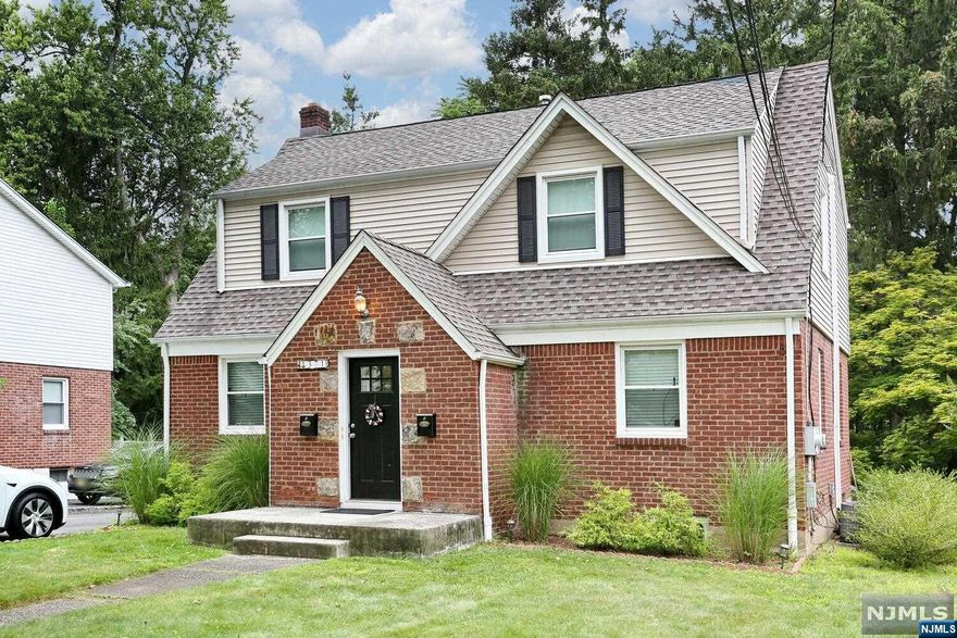 Don't miss this updated two family located on a quiet street close to downtown Ridgewood. Easy commute to NYC from train or bus. Recent updates include roof, siding, AC/Heat. Separate Utilities. Landlord pays for water. Each apartment has LR, DR, Kitchen, 2 Bedrooms, Full Bath, and access to half of divided basement for each tenant for storage. Large private backyard and large wide driveway. Ridgewood offers great shopping, dining, schools, recreation fields and parks! Great investment opportunity!