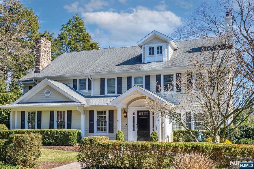 Stunning center-hall colonial blends modern updates with timeless elegance in one of Ridgewoodâ€™s most sought-after neighborhoods. Beautifully updated eat-in kitchen with high-end appliances and a spacious island flows into the oversized family room, dining room, and living room. A powder room, home office, 2 fireplaces, mudroom area with back porch access complete the first floor. Upstairs, five bedrooms and four full baths include a large primary suite with soaring ceilings, a walk-in closet, and a luxurious en-suite bath. A second-floor laundry adds convenience, while the finished third floor offers an ensuite bedroom and a recreation room. The finished basement features a powder room and storage and outside entrance. Step outside to a private backyard retreat with a bluestone patio, outdoor kitchen/fireplace, and a charming back porchâ€”perfect for relaxing or entertaining. Located on a private street in the coveted Old Country Club section, just steps from Ridge Elementary and GWMS