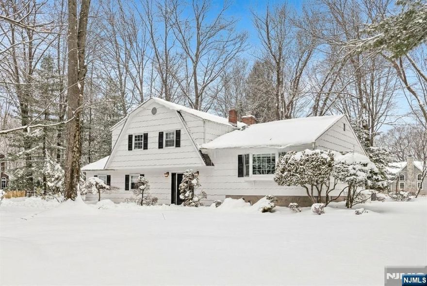 Welcome to this beautifully maintained Sugar Maple split, ideally situated on a quiet cul-de-sac just moments from restaurants, shopping, schools & everyday conveniences. A spacious entry flows seamlessly into the family room with a charming stone-faced fireplace, while a nearby mudroom, laundry area, powder room & and direct access to the 2-car garage provide effortless functionality. Upstairs, a light-filled living room opens to the dining room and eat-in kitchen, creating an ideal layout for daily living. The 2nd floor offers 3 generously sized bedrooms, including a primary suite with 2 closets and a private ensuite bath, along with a well-appointed hall bath featuring a double vanity. The lower level presents additional potential, whether for a recreation room, home office or playroom. Set on over 2/3 of an acre of level property, the expansive yard offers ample space for entertaining, recreation, or future expansionâ€”an exceptional opportunity in a highly desirable location.