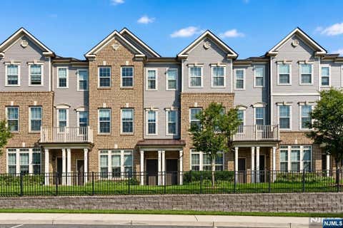 Photo of 78 Leahy Drive #4909, Wood Ridge, NJ 07075 (MLS # 26032240)