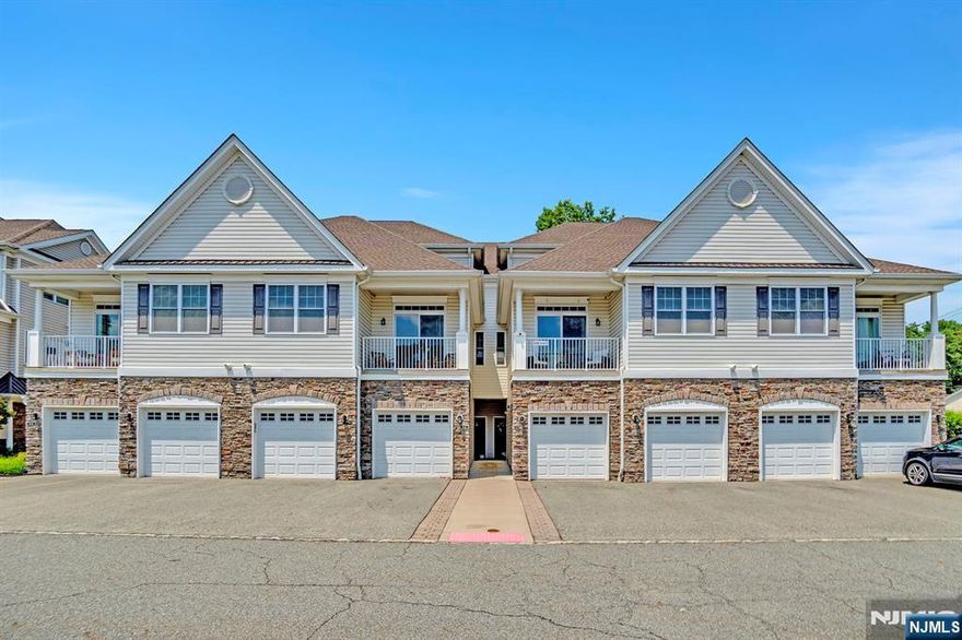 Experience this incredible 2016 built Townhome in highly sought-after Lakeland Village community within 30 miles from NYC! Upon entry you are greeting by an Open-Concept Floor Plan featuring Soaring High Ceilings, gleaming hardwood floors, and modern touches all-throughout blending style & comfort. The 1st level is a bright & inviting floor plan highlighted by a gorgeous Kitchen with custom Light Fixtures, high-end Granite Countertops, Stainless Steel Appliances, and Center Island / Breakfast Bar that opens to a designated Dining area & Living space with awe-inspiring Vaulted Ceilings, Tall Windows & access to your very own private Balcony perfect for entertaining. Ascend upstairs where you will find newer laminate flooring and a BONUS Loft space overlooking the 1st-floor living space ideal for a Home Office, Exercise Room, Playroom or Family Room. The Primary Bedroom includes Trey Ceilings, custom Accent-Walls, an En-Suite Bathroom with Dual Vanity Sink & a Walk-In Closet. An additional Bedroom, Full Hallway Bathroom & conveniently located Laundry Room completes the 2nd level. The Oversized Garage offers ample space with room for storage. Close to Shopping, Restaurants & easy access to NYC via major highways. Come make this Townhome yours before someone else does!