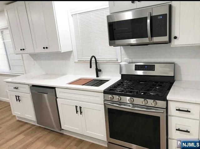 Rental Property at 326 Taft Pl 1, Harrison, New Jersey - Bedrooms: 3 
Bathrooms: 2 
Rooms: 5  - $2,600 MO.