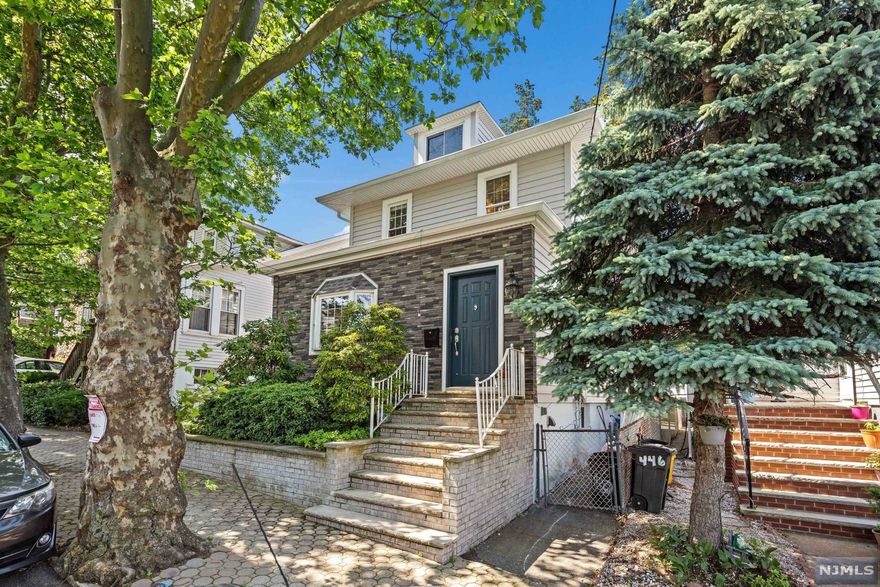 Welcome to 444 Park Ave - A renovated colonial in Fairview's most desirable neighborhood - This tree lined street is a stone's throw away from the Cliffside Park Border, offering easy access to NYC transportation - The home features hardwood floors, updated kitchen with custom cabinetry, stainless steel appliances, porcelain flooring, timeless double pane windows, formal dining room with wainscoting opens to living room and den - 3 Bedrooms and full bathroom upstairs - finished basement with full bathroom and walk out to a large yard, a private oasis, featuring majestic foliage, a paver patio, lawn, custom planters, complete with a 2 Car garage and plenty of parking! Central A/C - Gas Heat - Prime Fairview location - steps from Anderson Avenue. Great opportunity to own a single family home in a great location with a large private yard!