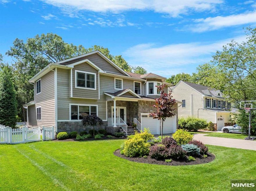 Welcome to 66 Andover Terrace, a distinguished residence in the heart of Glen Rock, NJ. This 10-year-old home offers a harmonious blend of modern design and comfort, featuring five spacious bedrooms and four well-appointed bathrooms. The open layout seamlessly connects the living, dining, and kitchen areas, creating an inviting space for both relaxation and entertainment. The gourmet kitchen is equipped with top-of-the-line appliances and opens to an impressive outdoor kitchen, perfect for alfresco dining and gatherings. The primary bedroom is a private retreat, complete with an en-suite bath that provides a spa-like experience. Additional bedrooms offer ample space and flexibility for family, guests, or home office needs. Entertainment options abound with a dedicated movie theater room, providing a cinematic experience from the comfort of your home. The property is ideally situated in Glen Rock, known for its vibrant community and excellent schools, making it a desirable location for families. 66 Andover Terrace combines luxury and practicality, offering a unique opportunity to own a home that caters to every lifestyle need. Experience the best of suburban living with easy access to local amenities and transportation links. Don't miss the chance to make this exceptional property your new home. Contact us today for a private viewing.
