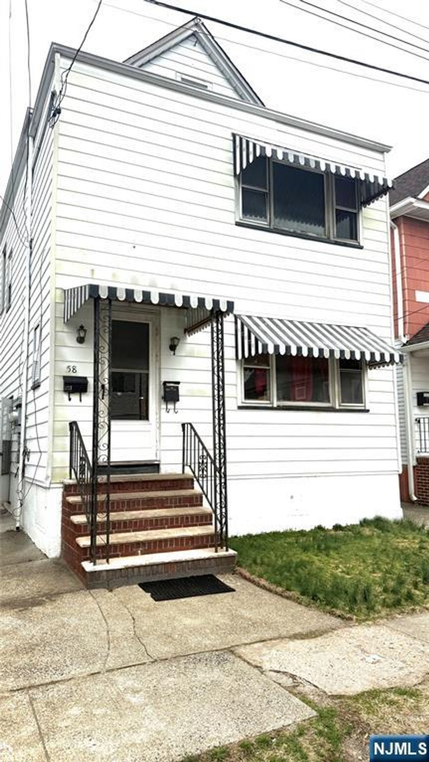 Great investment opportunity! This 2-family home offers two units, each featuring an eat-in kitchen, living room, dining room, 2 bedrooms, and 1 full bath. Additional highlights include a partially finished attic, full basement with walk-out to backyard, and an oversized one-car garage. Property needs TLCâ€”ideal for investors or buyers looking to add value. Endless potential! The property is being sold in as-is condition.