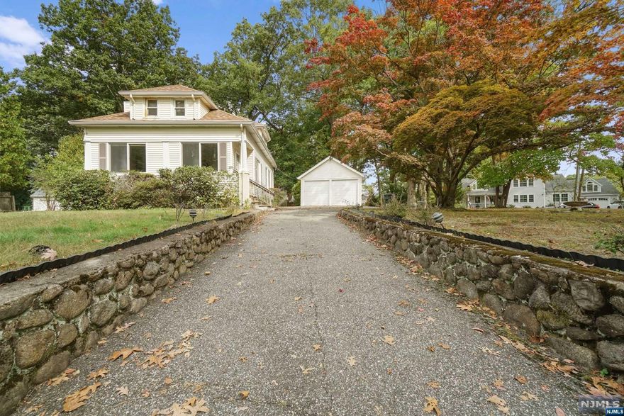 Attention all builders, investors, flippers and do-it-yourselfers! This home is calling for someone to come in and make it from good to fabulous. The current owners have lived here for 50+ years and now it's time for someone to restore this gem. Step inside to the 3-season porch and into a living room with wood-burning fireplace and parquet wood flooring. Down the hall is two bedrooms, a full bath and galley kitchen with dining area. The second floor bedroom offers fabulous storage, and a full, partly finished basement offers laundry and a rec room. Outside is a wrap around driveway from Hillcrest Ave to Short Street. And the two-car garage has loft storage. Corner lot, located on the border of Wyckoff and Midland Park, this home has the potential to be your next dream home! This home is being sold strictly 'As Is.'