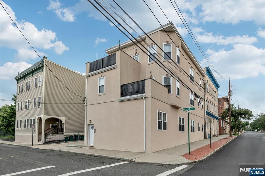 Hard-to-find 3BR/2BA condo in a prime commuter location! Don't miss out on this beautifully updated, move-in ready 3BR/2BA condo with private entrance and soaring ceilings. Sun-filled interior showcases gleaming hardwood floors, central A/C, and an updated eat-in kitchen with granite countertops and stainless steel appliances. Open-concept living/dining area is perfect for relaxing or entertaining. All 3 sun-filled bedrooms boast high ceilings. Versatile finished basement with washer/dryer adds even more storage potential and flexible space ideal for a home office, gym, or playroom. Deeded parking conveniently located next to building. Unbeatable location just 1 block to NYC direct train! Moments to Montclair's vibrant downtown filled with top-rated dining, boutique shopping, and arts. This is truly an opportunity not to be missed!