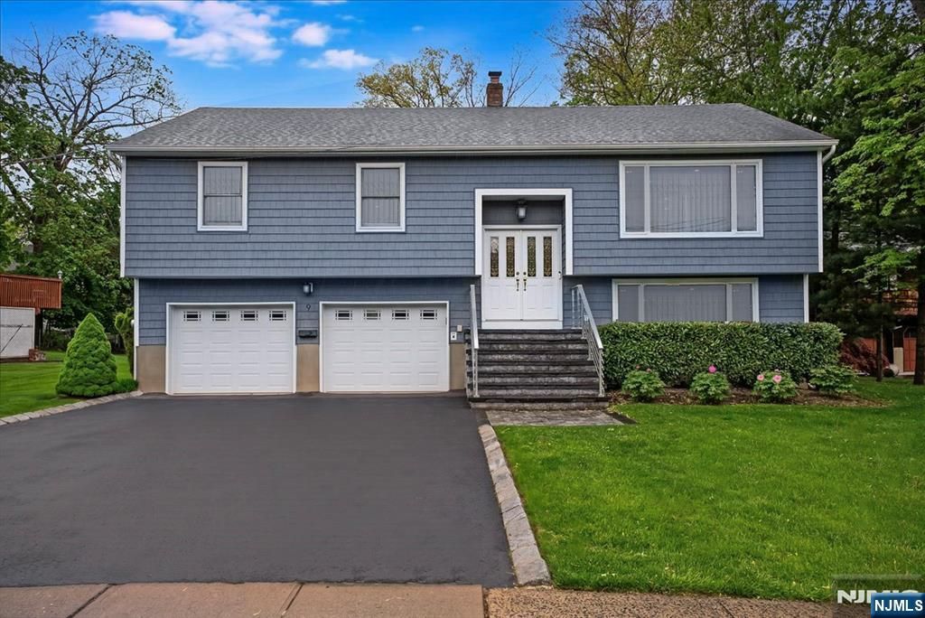 Photo of 9 Arthur Terrace, Livingston, NJ 07039 (MLS # 26019071)