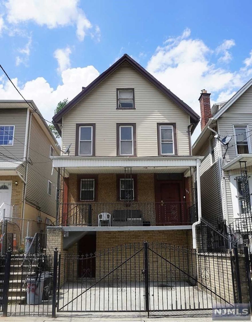 Come check out this amazing value in the booming and evolving North Newark!!! Bring your vision and ideas to life with over 2100 Sqft of living space, in addition to a semi finished walk up attic that offers 2 rooms, the unfinished basement does have a walk out to the front of the house, and the Drive way offers space for 2 cars. Walking distance to the light rail and all major highways 280, parkway & NJ Turnpike are all just a few minutes away. Make this your dream home, in a fast evolving neighborhood. Sold strictly as is, seller is elder & will make no repairs.