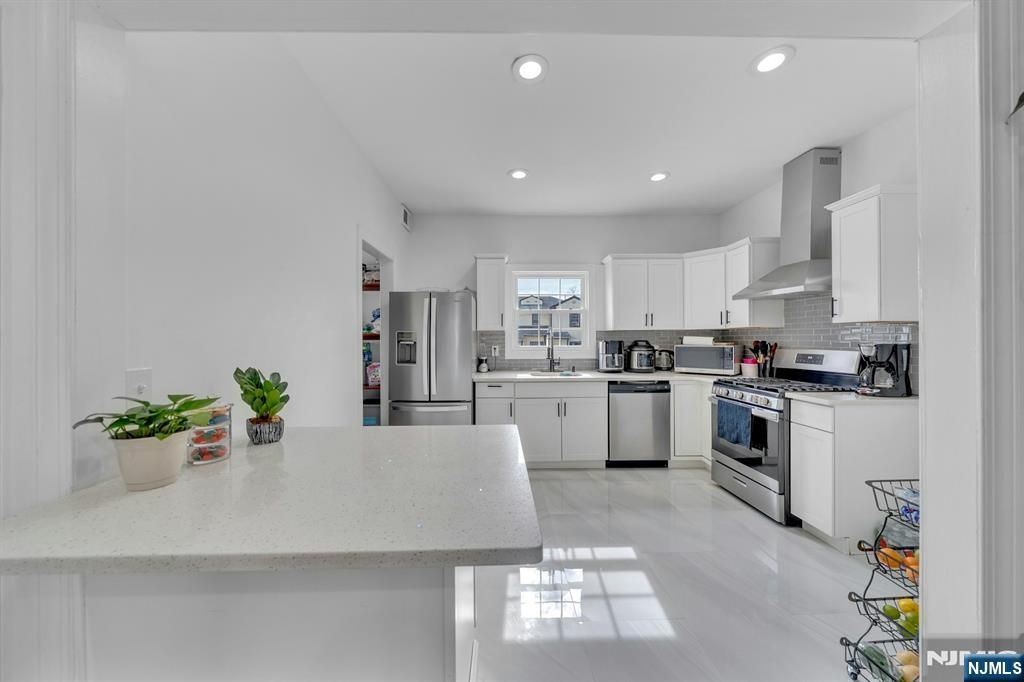 Photo of 106 Paine Avenue, Irvington, NJ 07111 (MLS # 26006192)