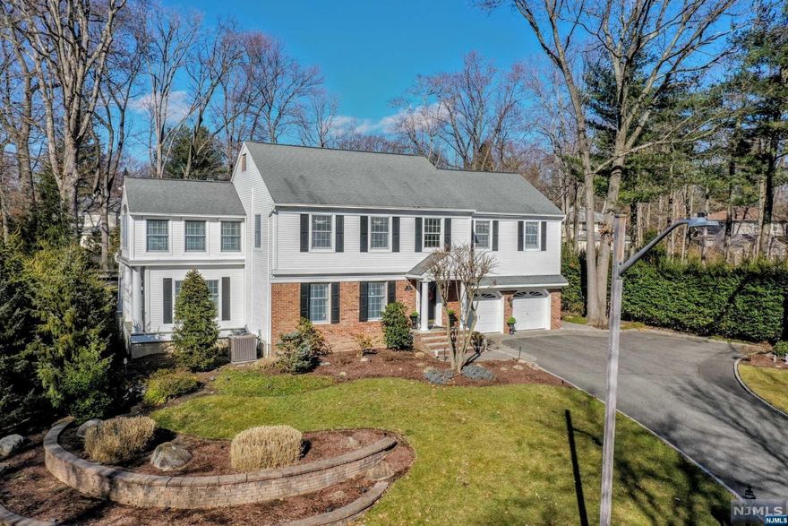 Spacious and gracious meticulously maintained traditional colonial situated on a quiet cul de sac in town. The two-story entrance foyer leads to a formal dining room and state-of-the-art kitchen complete with a center island, granite counters, classic white cabinets, and a breakfast nook/sun room with a window seat. You will enjoy both a family room with a cathedral ceiling and gas fireplace, as well as a den w/built ins. A PR and 3-car garage complete the first floor The beautiful primary suite including a dressing room, sitting room, and marble and cherry bath, as well as 4 additional bedrooms and 2 baths, are featured on the second floor. You will love relaxing on the two-tier deck surrounded by a private fenced-in backyard with ample room for a pool. A huge finished basement also offers an exercise room, laundry, and full bath. See amenities too numerous to mention attached.