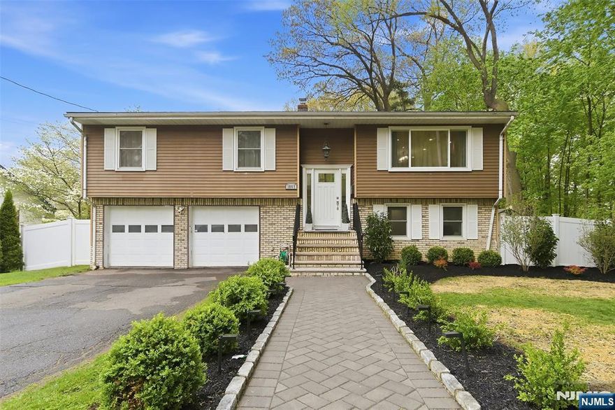 True pride in ownership shines throughout this RARE 4-bedroom, 2-bath Bi-level home, thoughtfully and fully renovated from top to bottom. Tucked away on a quiet, tree-lined dead-end street, this property offers both privacy and a peaceful setting. Once inside, youâ€™ll immediately notice the expansive, fully renovated kitchen-truly the heart of the home. Featuring a stunning floating island, sleek quartz countertops, and stainless steel appliances, this space is as functional as it is stylish. Whether youâ€™re an avid chef or simply love to cook and entertain, this kitchen offers the perfect setting for hosting and everyday living. Open-concept living at its finest, the main level offers three spacious bedrooms and a fully renovated bathroom, combining modern style with everyday convenience. Bright and airy living spaces create a seamless flow, ideal for both relaxing and entertaining. With generous living areas, updated finishes throughout, and a flexible layout, this home is designed to meet a variety of lifestyle needs. The ground level adds even more versatility, featuring a fourth bedroom, a full bathroom, and a family room with sliding doors leading directly to the backyard. The home also features a two-car garage complete with a dedicated at-home gym, offering the perfect space for fitness and additional storage. Located near major highways, parks, schools, places of worship, with convenient access into Manhattan. Schedule your appointment today!