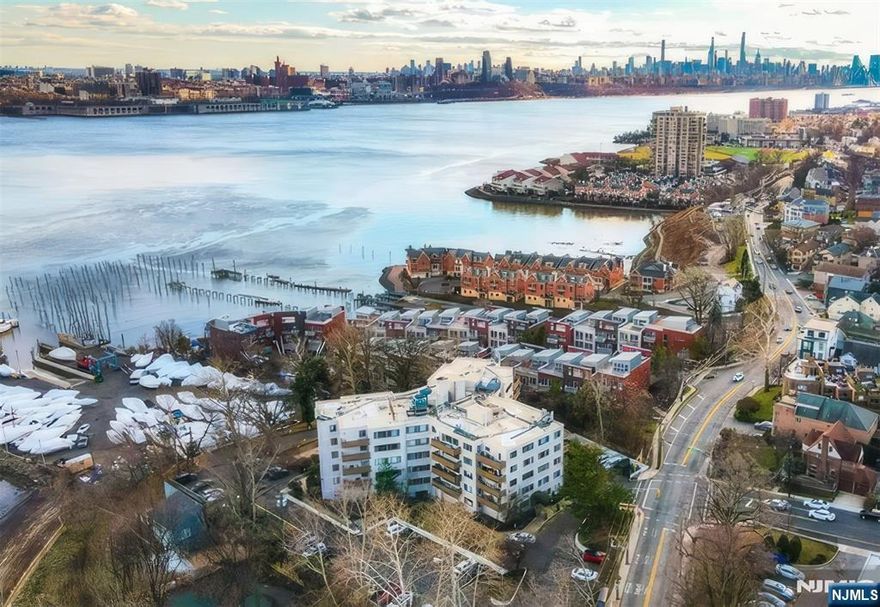 Welcome to Caribbean House, a boutique mid-rise elevator cooperative offering exceptional waterfront living along the Hudson River. This spacious and sun-filled one-bedroom, one-bath home features stunning views of the Hudson River and the George Washington Bridge. The residence is well maintained, with hardwood floors, generous closet space, and a bright, open layout. This well-managed community offers an on-site superintendent and excellent amenities. Monthly maintenance includes heat, gas, water, hot water, one parking space, and access to a beautiful outdoor pool overlooking the Hudson River, marina, and NYC skyline. Additional conveniences include a laundry room. Ideally located near shopping, dining, and all that Edgewater has to offer, with easy access to NYC by bus, car, or ferry.