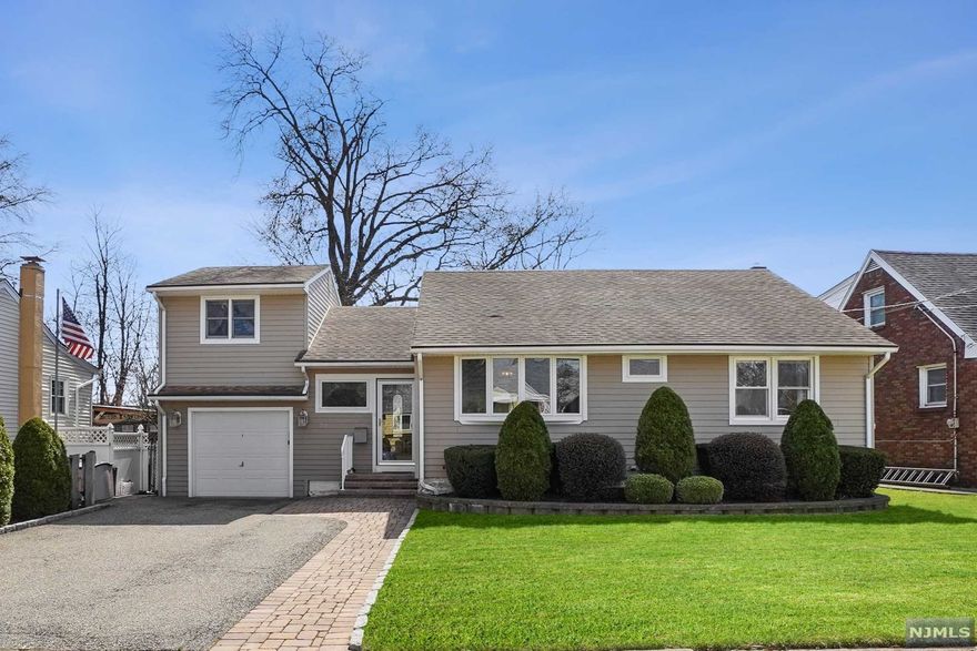 Welcome to 172 Fenscak Ave in Elmwood Park. This 3 bedroom 2 bath cape cod style home has an expanded family room addition with wood burning fireplace, updated kitchen with granite counters and stainless steel appliances. The primary bedroom has it's own ensuite bathroom with shower and there's a second bedroom on the main level. The large dining room is perfect for hosting all your gatherings with wood floors throughout the first level. Upstairs you'll find an additional 2nd floor bedroom above the 1 car attached garage. In the basement, there's a summer kitchen, workshop, laundry, and plenty of storage. This home includes central a/c, updated baseboard heat, updated electric panel and newer roof with leaf free gutters. Outdoors there is a covered eating area on the deck to host all your barbecues and storage shed in the backyard. Schedule your private tour today!