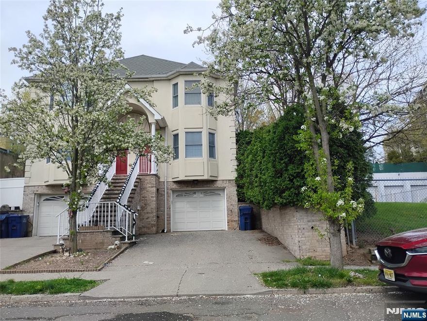 ***Spacious Duplex In prime Hackensack Location- Ideal for NYC Commuters! *** Welcome to this large attched duplex home[ built in 2006 [ ,perfectly situated in the heart of Hackensack - just miniutes from nyc transportation ,premier shopping ,and everyday conveniences .enjoy the close proximity to top north jersey destinations including Westfield Garden state Plaza ,The shops at riverside ,and bergen Town center ,as well as parks and house of worship and easy access to George Washington Bridge for quick drive into NYC .This home offers both space and versatility ;the Ground level featurs ; a large garage plus a bonus room in the rear - perfect for home office,Den,or Guest space - with door leading to the private ,quiet backyard . First floor ; features an entry hall ,an oversized living room,and beautifully updated modern huge eat in kitchen with a dedicated dining area - ideal for entertaining,A convenient guest half bath completes this level .Second floor has a spacious primary bedroom with a walk in closet and full bath,along with two additional generously sized bedrooms and anther full bath . this home is perfect for comfortable living,entertaining and commuting-call any new jersey real estate agent to schedule your private showing Before its gone ! homes like this in Hackensack dont last