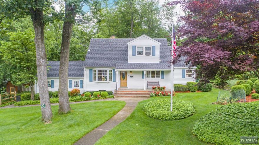 Amazing home, off the charts curb appeal and top rated location in Packanack Lake! Welcome Home: inviting & beautiful formal living room w/ fireplace, opens to the dining room with sliding glass doors leading to private deck, beautiful landscaping, secluded side and back yard. Newer kitchen with custom cabinets, all newer appliances, back splash and eating area. Incredible recreational rooms: perfect opportunity with oversized family room: high ceilings, skylights, wall of windows and tons of natural light. All ready for entertaining all year long. Newer windows, Central Air, Hot water heater and updated bathrooms. Oversized garage and car port for convenience. Very well maintained and large storage areas. Great location. Top rated school systems. Minutes to shopping, restaurants, major highways, Whole Foods, Trader Joe's and NJ Transit Bus & Train Center. Enjoy Packanack Lake life: swimming, sailing, two beaches, community sports, club activities, golf and tennis available.