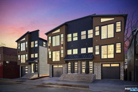 Photo of 132 N 17th, East Orange, NJ 07017 (MLS # 26010564)