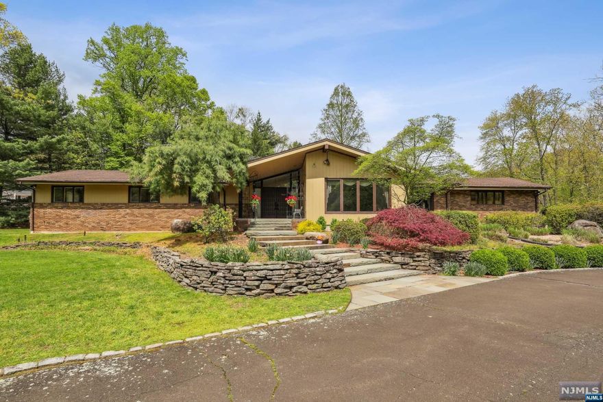 Picturesque property located at the end of a cul-de-sac. 3.5 acre lot that is expansive and level. Ideal for remodel and expand or a new rebuild. One of the best lots in Saddle River. With open southern exposure the property gets incredible light. Perfect for buyers who love a bright and serene feel to the home. Pictures and drone videos to be taken Early next week. Come tour this gem. Seller holds a real estate license.