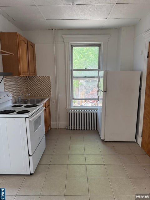 Photo of 1650 John St #1, Fort Lee, NJ 07024 (MLS # 26013440)