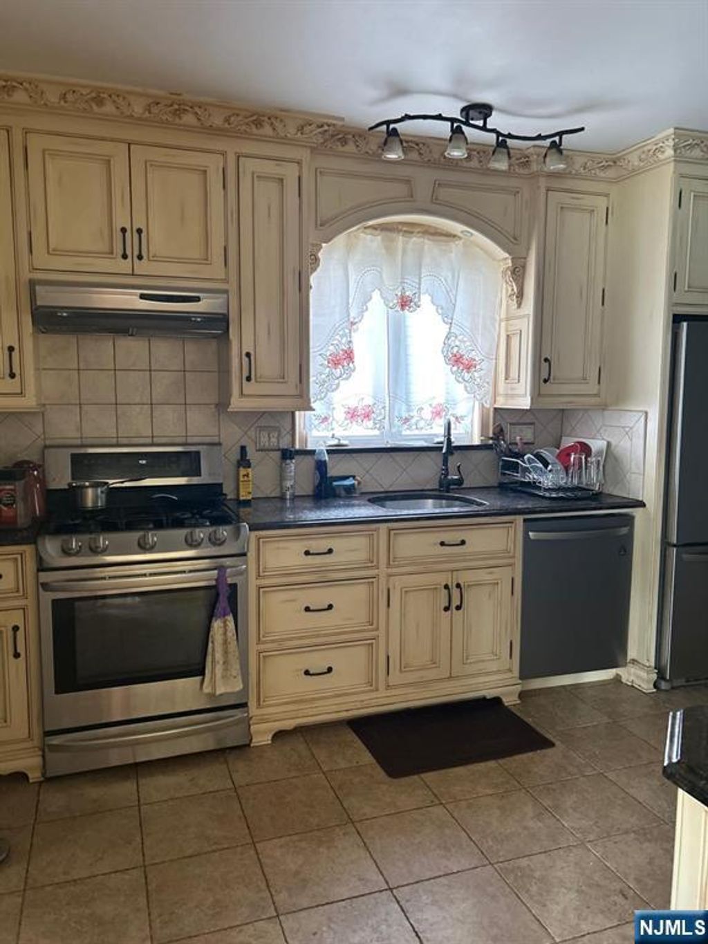 Photo of 521 Olympia Avenue, Cliffside Park, NJ 07010 (MLS # 26010617)