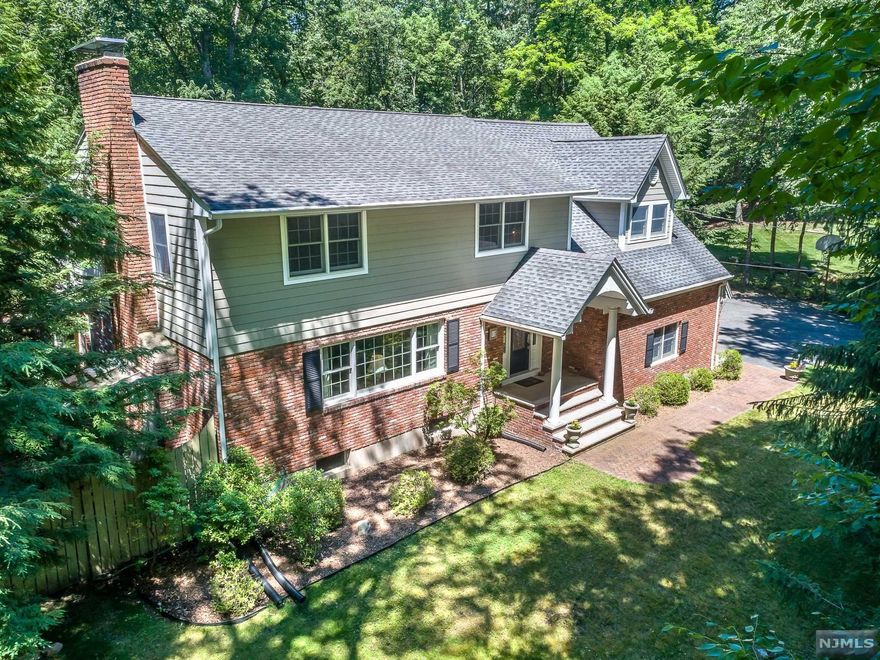 Set Within the Exclusive 24 Hr. Guard Gated Lake Community of Smoke Rise You Will Find This Sensational 4 Bedroom, 4 Bath CHC.This Home Combines Elegant Design with Natural Accents. Gourmet Kitchen with Blue Star 8 Burner Dual Oven Gas Range, Cherry with Granite, SS Appl, Breakfast Bar & Separate Dining Area. A LRM with FRPL, Formal Dining Rm with Hardwood Flrs & Crown Moldings. Open to the Great Rm with a Beamed Ceiling, Fireplace, Custom Built ins with a Wet Bar. Main Level Full Bathrm. The Primary Suite Offers a Walk-In closet, Hardwd Floors and a Ensuite with a Double Sink Vanity with Marble a Jetted Tub & Shower Stall. An Additional Bedrm with an Ensuite, Two Additional Bedrms and a Full Bathrm. The LL Is Finished with Spaces including a Recreation Rm with a Fireplace and Utility Rm with Newer Boiler. Situated on Private Grounds including a round Gunite Pool and Several Patio's for Grilling and Relaxing.