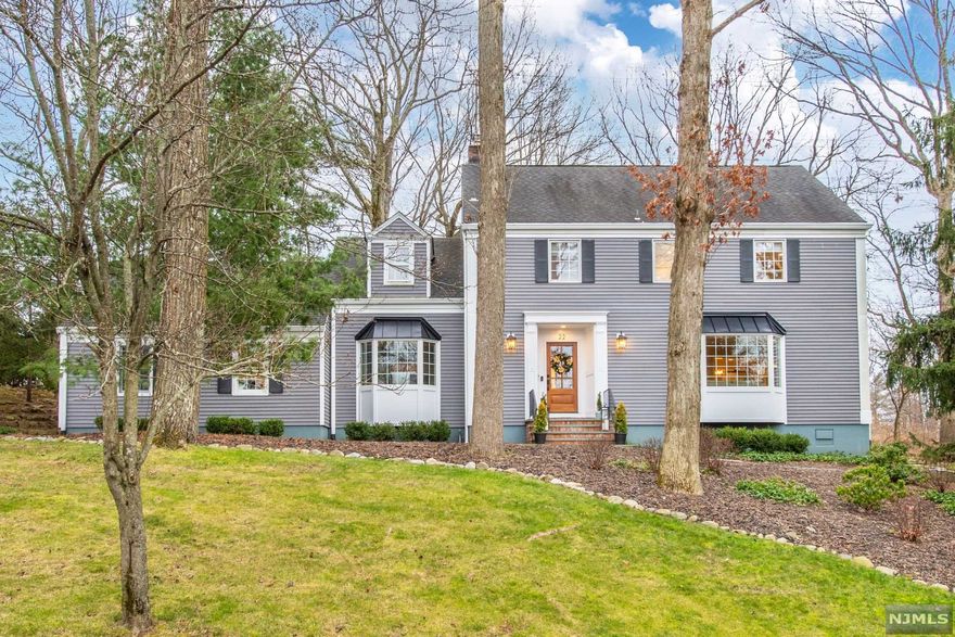 Absolutely breathtaking! This 4 bedroom, 2.5 bath colonial has been renovated from top to bottom and is located in a desirable section of North Caldwell! 1st FL feat. LR, DR, gorgeous renovated kitchen w/quartzite counters, SS appliances, under-cabinet lighting, backsplash, pantry, & coffee bar w/fridge, as well as an office w/French doors, bonus room/playroom, powder room & mudroom/laundry room w/radiant flooring. 2nd FL boasts master suite, WIC, & FB w/stall shower & granite vanity, 3 great-sized guest BR & guest FB with soaking tub/shower. Other features incl. attached 2 car garage, radiant flooring in all bathrooms, farm sinks, new & refinished hardwood floors throughout, new windows 1st FL, new highhats throughout, walnut front door, crown molding, new railings, 1 new heating unit & HWH & beautiful barn doors! Blue Ribbon Schools & close to NYC transportation!