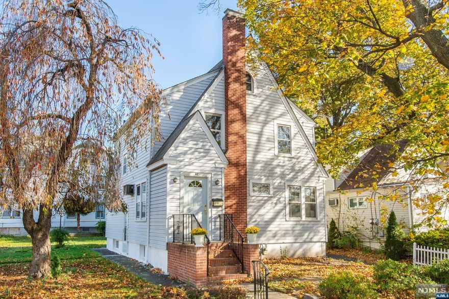 Welcome to this lovely oversized corner property in highly desirable neighborhood. This solidly-built charming home is waiting for you. Features include cozy fireplace, wood floors, sunroom, 2 car detached garage, and much more. 3 Bedrooms, 1.1 baths, walk-up attic. Gorgeous property. Close to houses of worship, shopping, transportation, parks, and schools.