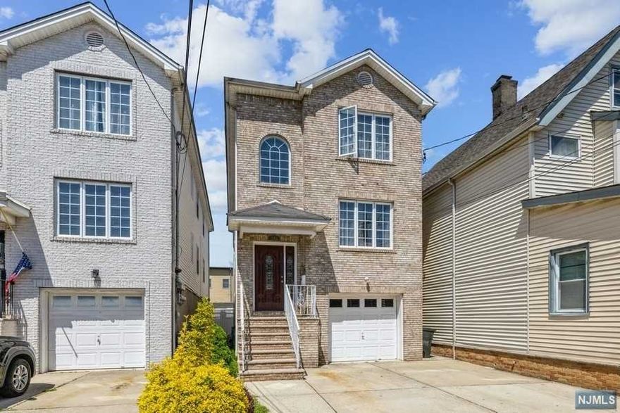 Welcome to this well maintained newer built 2 family home. Enjoy the same open floor plan boasting a living room, dining room combo, kitchen, 3 bedrooms and 2 baths in each unit. The ground floor offers a rec room with another bathroom and exit to a beautiful fenced in private yard for entertainment. Each unit has central ac and forced heat. As you walk down to the 2 car garage, there's a private room with laundry hook up for both units independently. This home is located in the heart of Harrison, close to all major highways, Path Train, West Husdon Park, Penn Station and it's less than 10 miles from NYC! Schedule your viewing today!